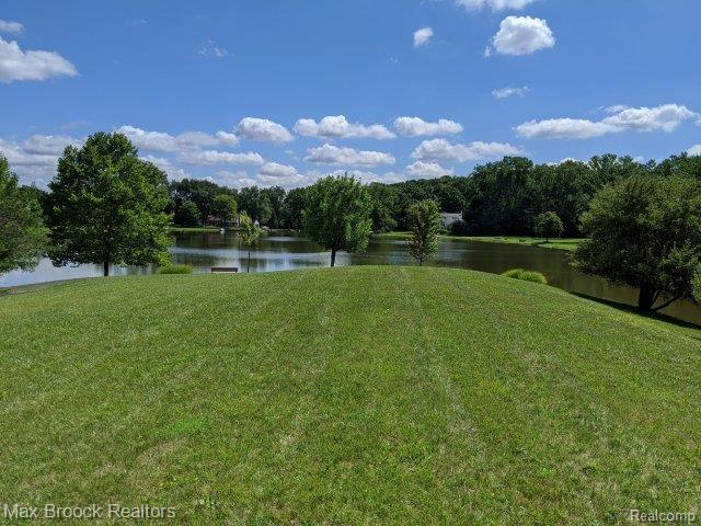 6810 Killarney Dr, Troy, MI 48098 - view of grassy yard featuring a water view