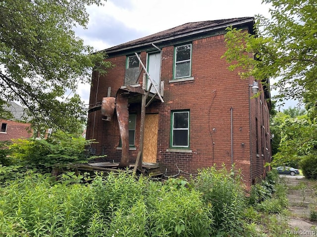 3962 Helen St, Detroit, MI 48207 - rear view of property with brick siding