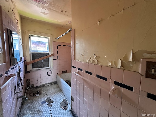 3962 Helen St, Detroit, MI 48207 - full bathroom featuring tile walls, bathtub / shower combination, and wainscoting