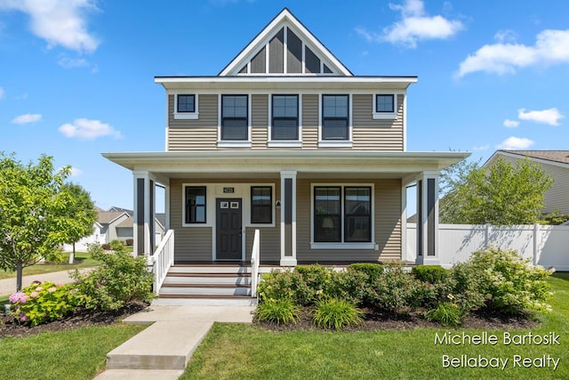 6725 Promenade St NE Unit 13, Rockford, MI 49341 - view of front of house with a porch