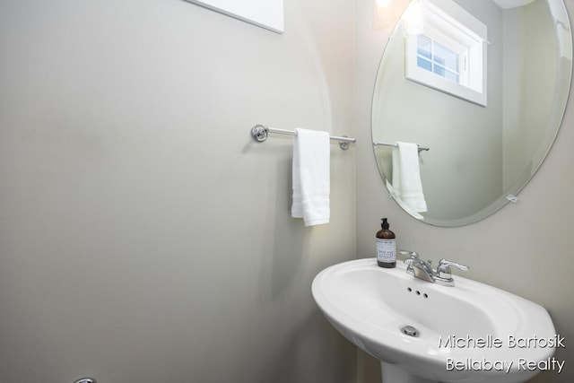 6725 Promenade St NE Unit 13, Rockford, MI 49341 - bathroom featuring a sink