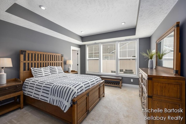 6725 Promenade St NE Unit 13, Rockford, MI 49341 - bedroom with light colored carpet, a textured ceiling, a raised ceiling, and recessed lighting