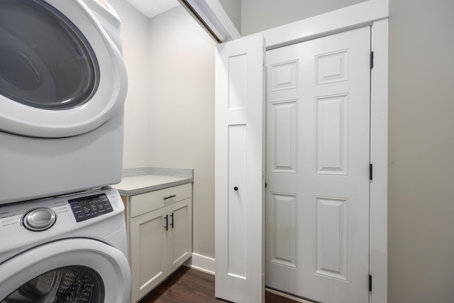 6725 Promenade St NE Unit 13, Rockford, MI 49341 - laundry room featuring stacked washing machine and dryer and dark wood-style floors