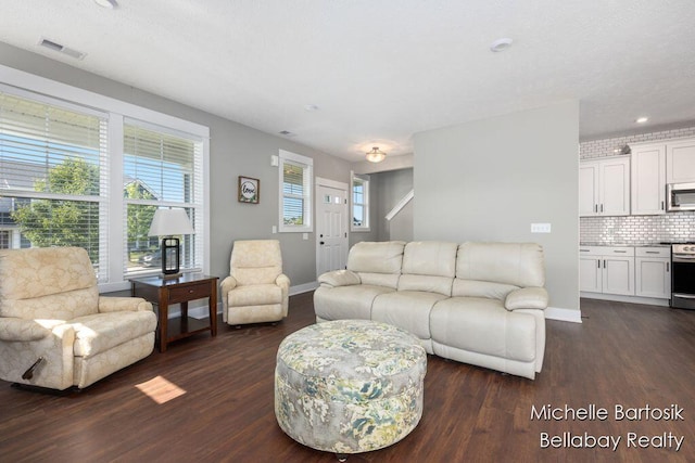 6725 Promenade St NE Unit 13, Rockford, MI 49341 - living area featuring dark wood-style flooring and recessed lighting