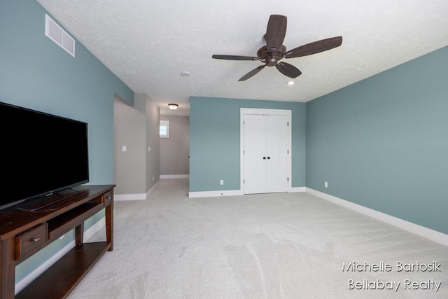 6725 Promenade St NE Unit 13, Rockford, MI 49341 - unfurnished living room with a ceiling fan and light carpet