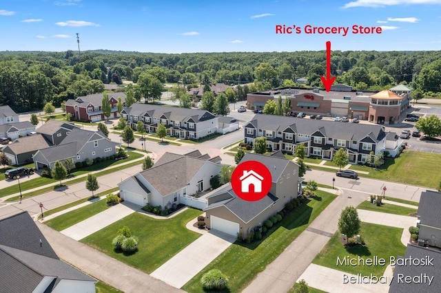 6725 Promenade St NE Unit 13, Rockford, MI 49341 - aerial perspective of suburban area with a forest