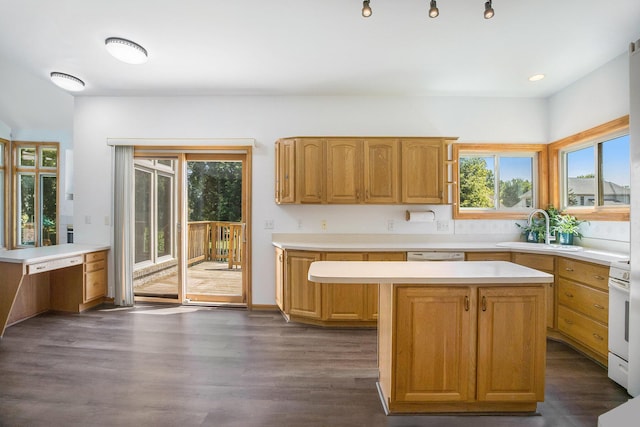 4213 Silverleaf Dr, Ypsilanti, MI 48197 - kitchen featuring light countertops, dark wood-style flooring, white appliances, a kitchen island, and recessed lighting