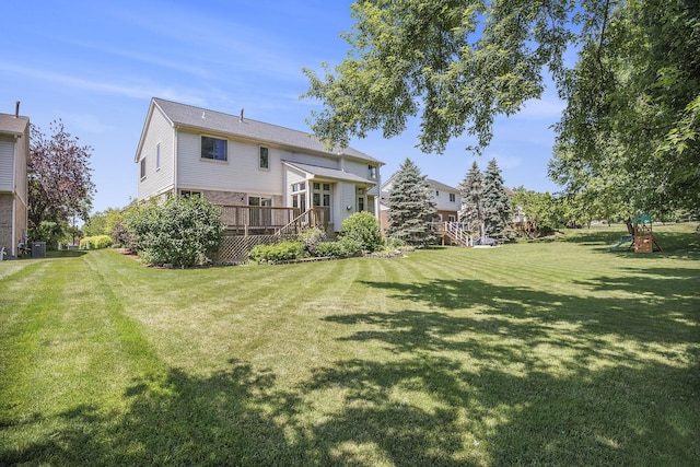 4213 Silverleaf Dr, Ypsilanti, MI 48197 - back of house with a wooden deck and a yard