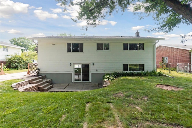 910 Newport Dr, Fenton, MI 48430 - rear view of house featuring a patio area