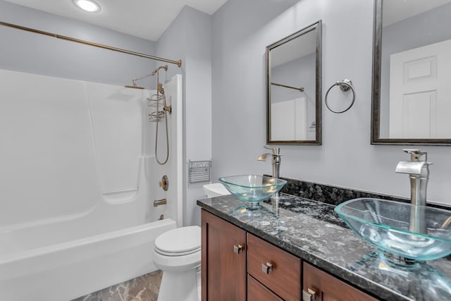 1615 Bunting Rd, Jackson, MI 49201 - full bath with vanity, bathing tub / shower combination, and marble look tile flooring