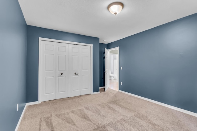 1615 Bunting Rd, Jackson, MI 49201 - unfurnished bedroom featuring carpet floors and a closet