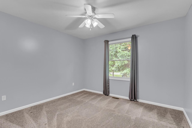 1615 Bunting Rd, Jackson, MI 49201 - carpeted spare room with a ceiling fan and baseboards