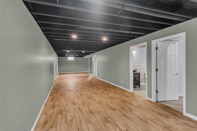 1615 Bunting Rd, Jackson, MI 49201 - finished below grade area featuring wood finished floors and baseboards