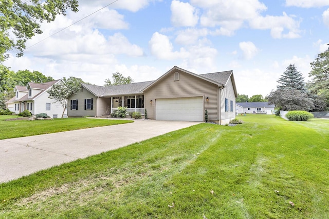 1615 Bunting Rd, Jackson, MI 49201 - single story home with a garage, a front lawn, and driveway