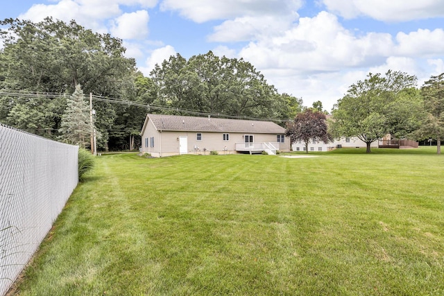 1615 Bunting Rd, Jackson, MI 49201 - rear view of property with a deck