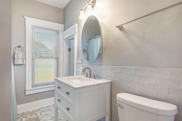947 Pearl St, Benton Harbor, MI 49022 - full bath with vanity, tile patterned floors, and tile walls
