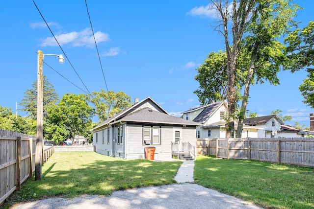 947 Pearl St, Benton Harbor, MI 49022 - rear view of house featuring a fenced backyard