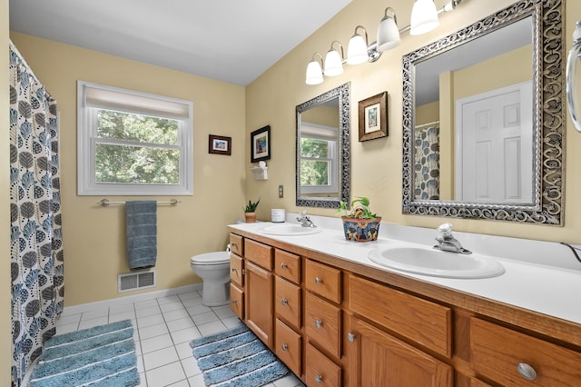 6794 Brickleton Ct, Portage, MI 49024 - full bath featuring tile patterned flooring, plenty of natural light, double vanity, and a shower with shower curtain
