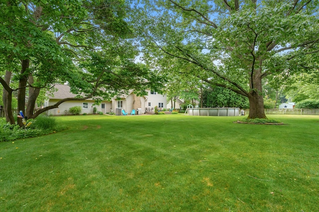 6794 Brickleton Ct, Portage, MI 49024 - view of yard featuring an outdoor pool