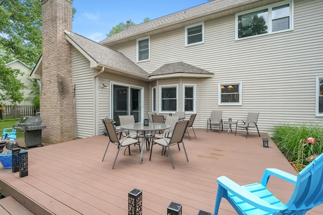 6794 Brickleton Ct, Portage, MI 49024 - wooden deck with grilling area and outdoor dining area
