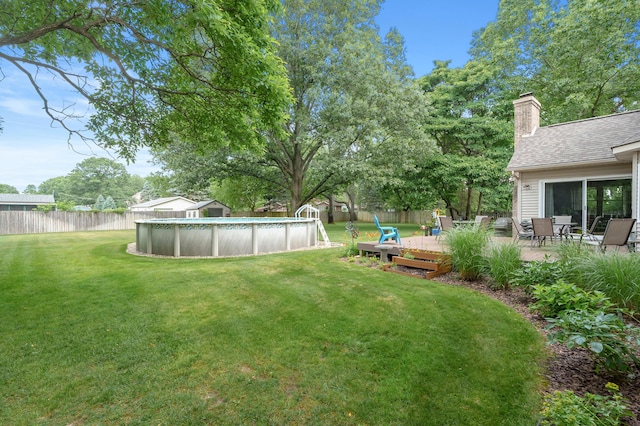 6794 Brickleton Ct, Portage, MI 49024 - fenced backyard with a wooden deck