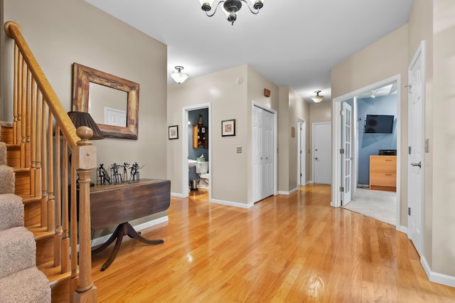 6794 Brickleton Ct, Portage, MI 49024 - foyer with light wood-style flooring and stairs