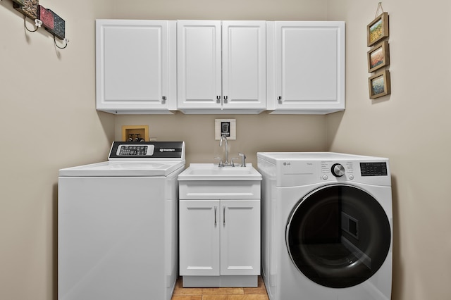 6794 Brickleton Ct, Portage, MI 49024 - washroom featuring washing machine and dryer and cabinet space