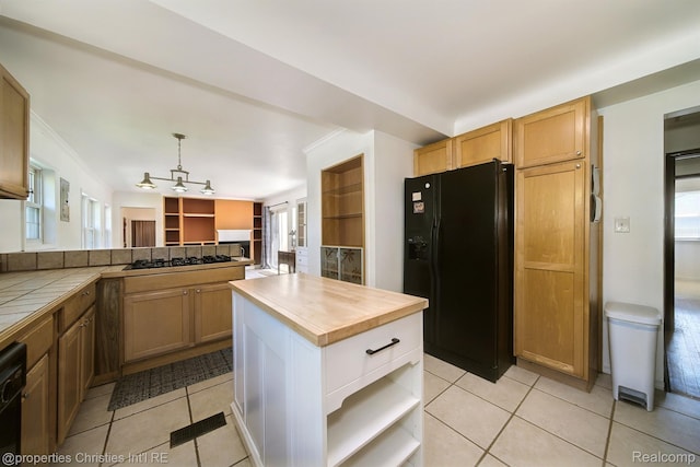 30160 Marshall St, Southfield, MI 48076 - kitchen with black appliances, open shelves, tile countertops, and plenty of natural light
