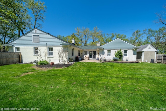 30160 Marshall St, Southfield, MI 48076 - rear view of house featuring a chimney and a patio
