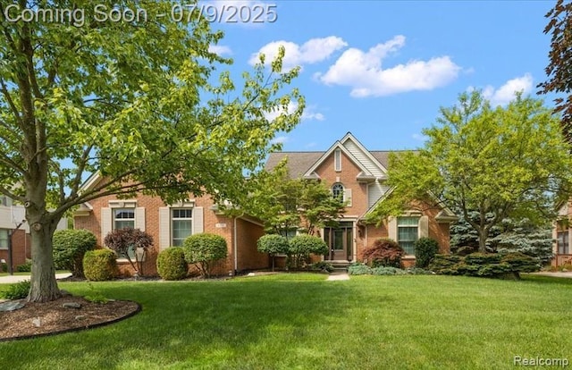 6591 Tree Knoll Dr, Troy, MI 48098 - obstructed view of property with a front lawn and brick siding