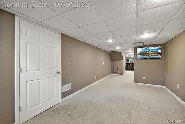 6591 Tree Knoll Dr, Troy, MI 48098 - finished below grade area featuring carpet flooring and a paneled ceiling