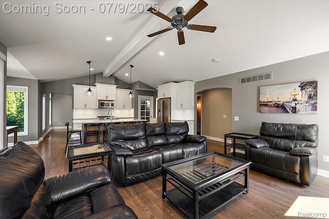 6591 Tree Knoll Dr, Troy, MI 48098 - living area featuring arched walkways, ceiling fan, dark wood finished floors, and recessed lighting