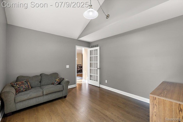 6591 Tree Knoll Dr, Troy, MI 48098 - living area with lofted ceiling and wood finished floors