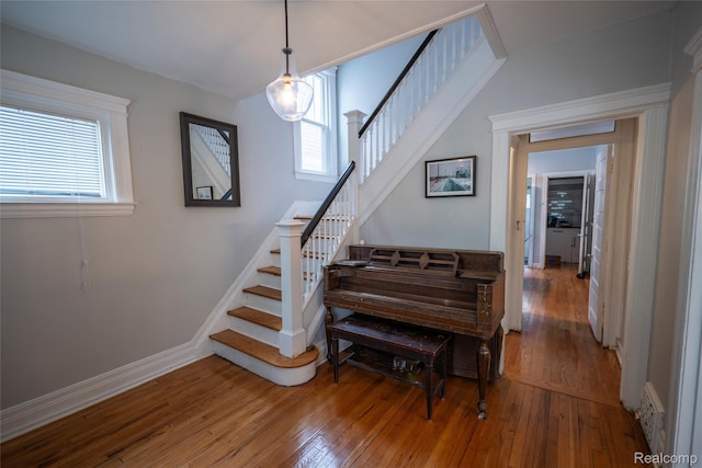 1731 Parker St, Detroit, MI 48214 - stairs featuring hardwood / wood-style floors and baseboards