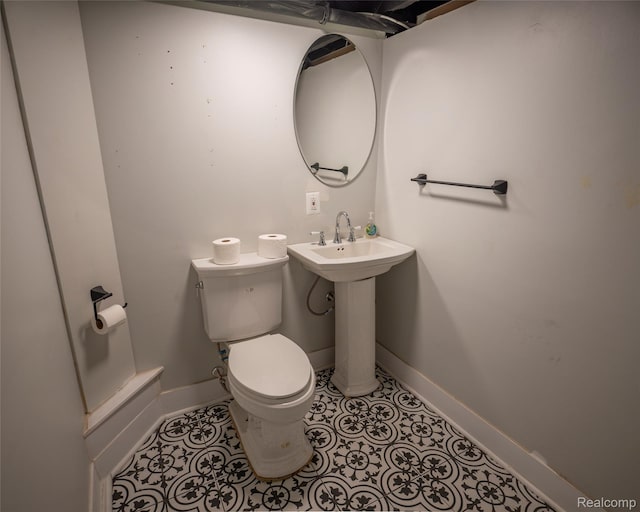 1731 Parker St, Detroit, MI 48214 - bathroom with toilet and tile patterned flooring