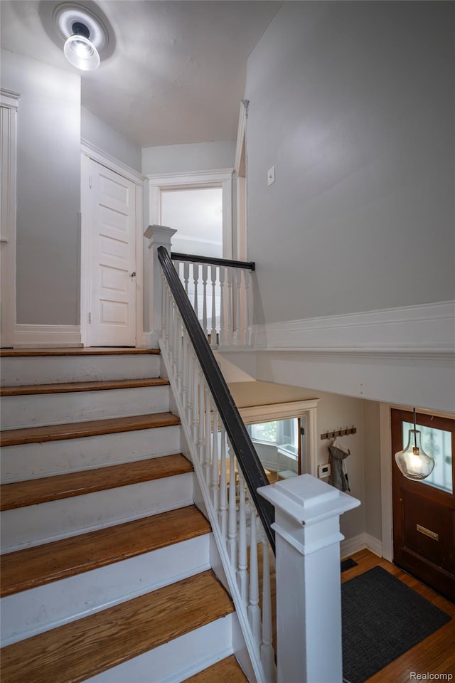 1731 Parker St, Detroit, MI 48214 - staircase featuring wood finished floors