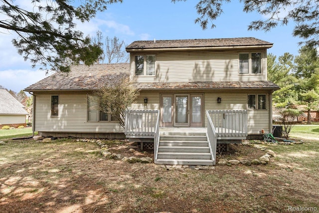 5103 Coachlight Dr, Fenton, MI 48430 - view of front of house featuring a deck