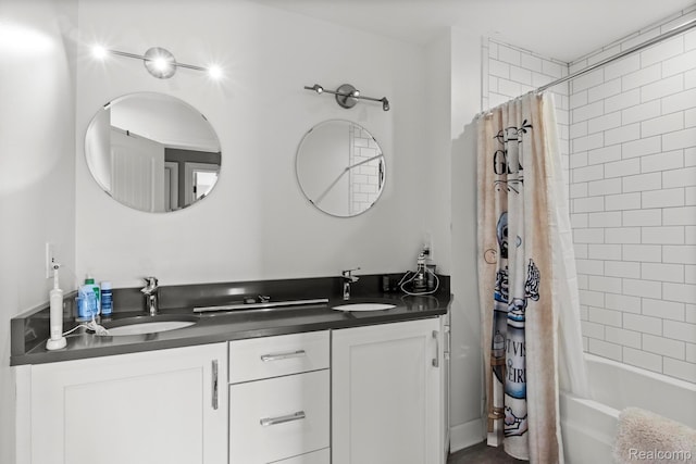 900 Mcdonald Dr, Northville, MI 48167 - bathroom featuring double vanity and shower / bathtub combination with curtain