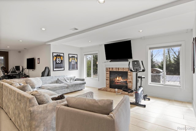 900 Mcdonald Dr, Northville, MI 48167 - living area with a fireplace, recessed lighting, and light tile patterned flooring