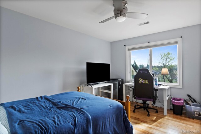 900 Mcdonald Dr, Northville, MI 48167 - bedroom featuring wood finished floors and ceiling fan