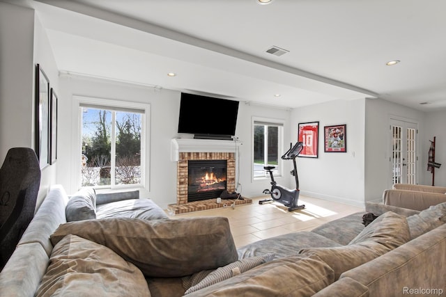 900 Mcdonald Dr, Northville, MI 48167 - tiled living area featuring a fireplace and recessed lighting