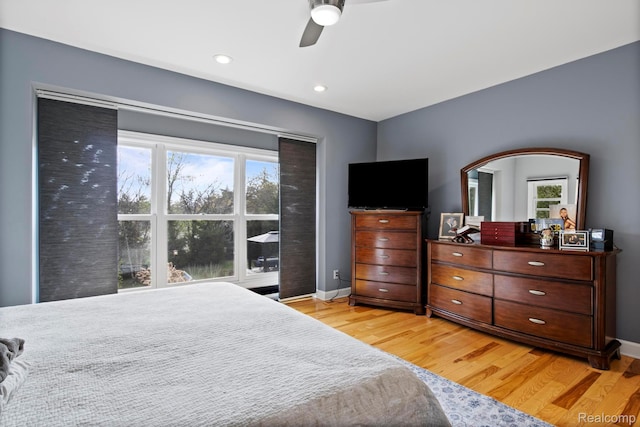 900 Mcdonald Dr, Northville, MI 48167 - bedroom featuring multiple windows, light wood-type flooring, recessed lighting, and ceiling fan