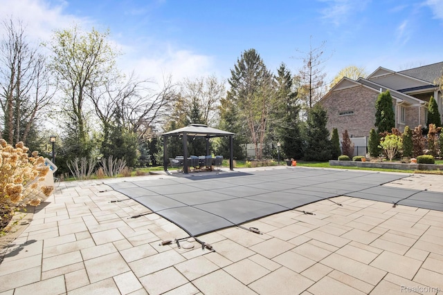 900 Mcdonald Dr, Northville, MI 48167 - view of swimming pool featuring a gazebo, a patio, and a covered pool