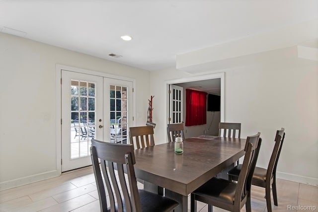 900 Mcdonald Dr, Northville, MI 48167 - dining room featuring french doors and recessed lighting