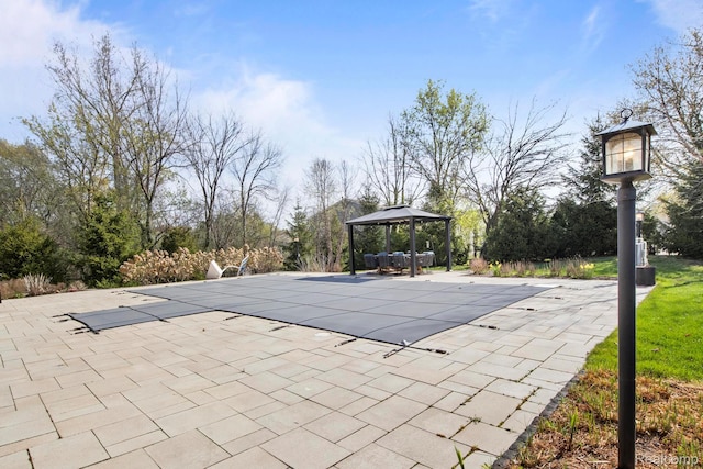 900 Mcdonald Dr, Northville, MI 48167 - view of pool featuring a gazebo, a patio area, and a covered pool