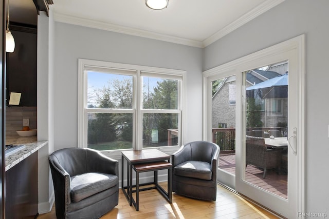 900 Mcdonald Dr, Northville, MI 48167 - sitting room with light wood-style floors, crown molding, and an office area