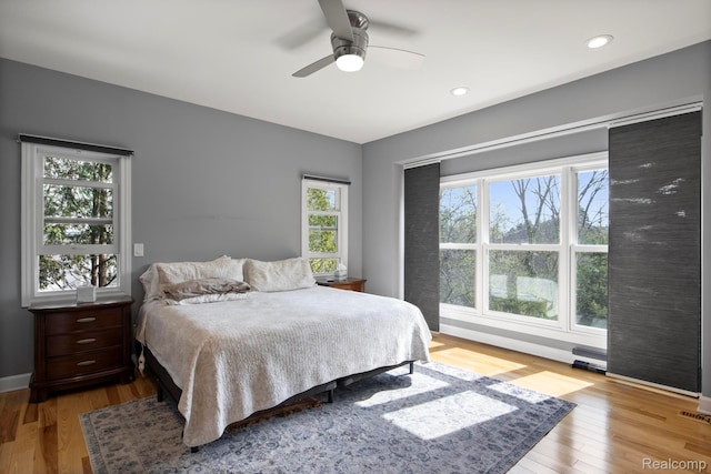 900 Mcdonald Dr, Northville, MI 48167 - bedroom with wood finished floors, a ceiling fan, and recessed lighting