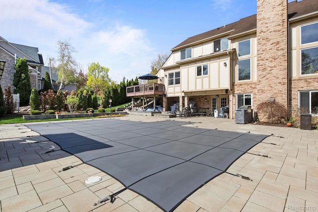 900 Mcdonald Dr, Northville, MI 48167 - view of swimming pool featuring a patio and a covered pool