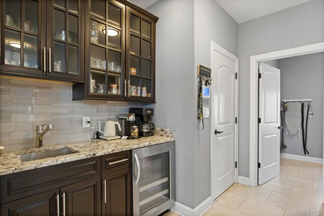 900 Mcdonald Dr, Northville, MI 48167 - indoor bar with wine cooler, tasteful backsplash, and light tile patterned floors
