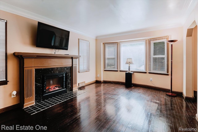 16219 Normandy St, Detroit, MI 48221 - unfurnished living room featuring hardwood / wood-style floors, a high end fireplace, and crown molding